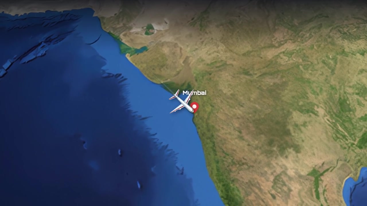 Satellite view animation follows a commercial airplane flying from Munich across continents to Mumbai