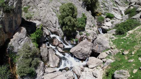 birth of a river. pure water. the formation of a river, when starting between rocks. aerial view. castril river. granada. spain