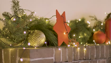 christmas decorations on a chinmey in the living room