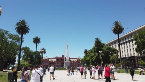 pov walk at plaza de mayo central urban park of buenos aires, vibrant latin capital of argentina