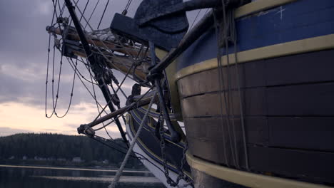 1700s sailing ship in port at sunrise