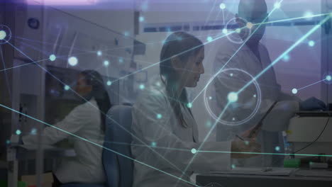 in lab, scientists analyzing digital network connections with animation overlay