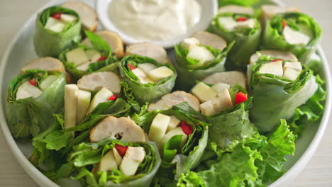 vegetables wrap or salad rolls with creamy salad sauce - healthy food style