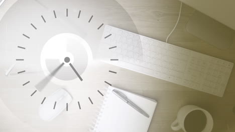 animation of clock moving over office desk with diverse items