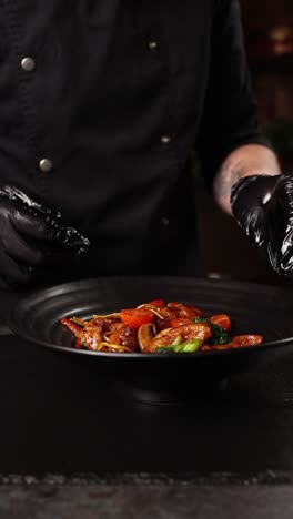 chef preparing asian stir-fry dish