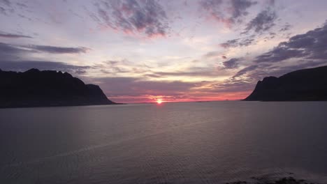 Aerial-of-a-fjord-at-sunset-on-Lofoten,-Norway