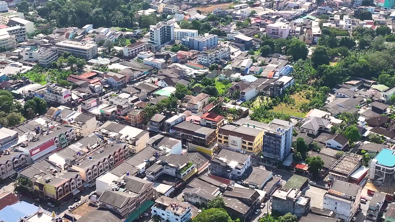 Aerial view over the streets in Phuket, Thailand. Roads and city buildings, urban. Cityscape
