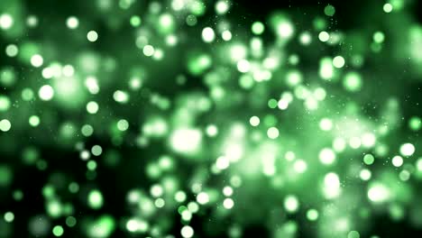 fondo de partículas abstractas desfocalizadas de 4k (verde) - video de stock de bucle