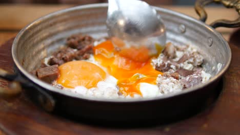 turkish breakfast with eggs and meat