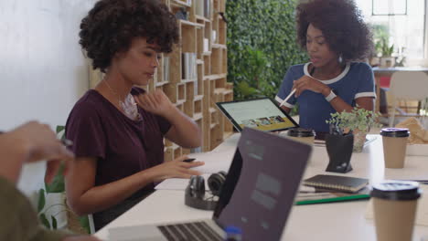 african american business people meeting creative graphic design team brainstorming marketing ideas team leader woman using tablet computer technology in office boardroom sharing strategy