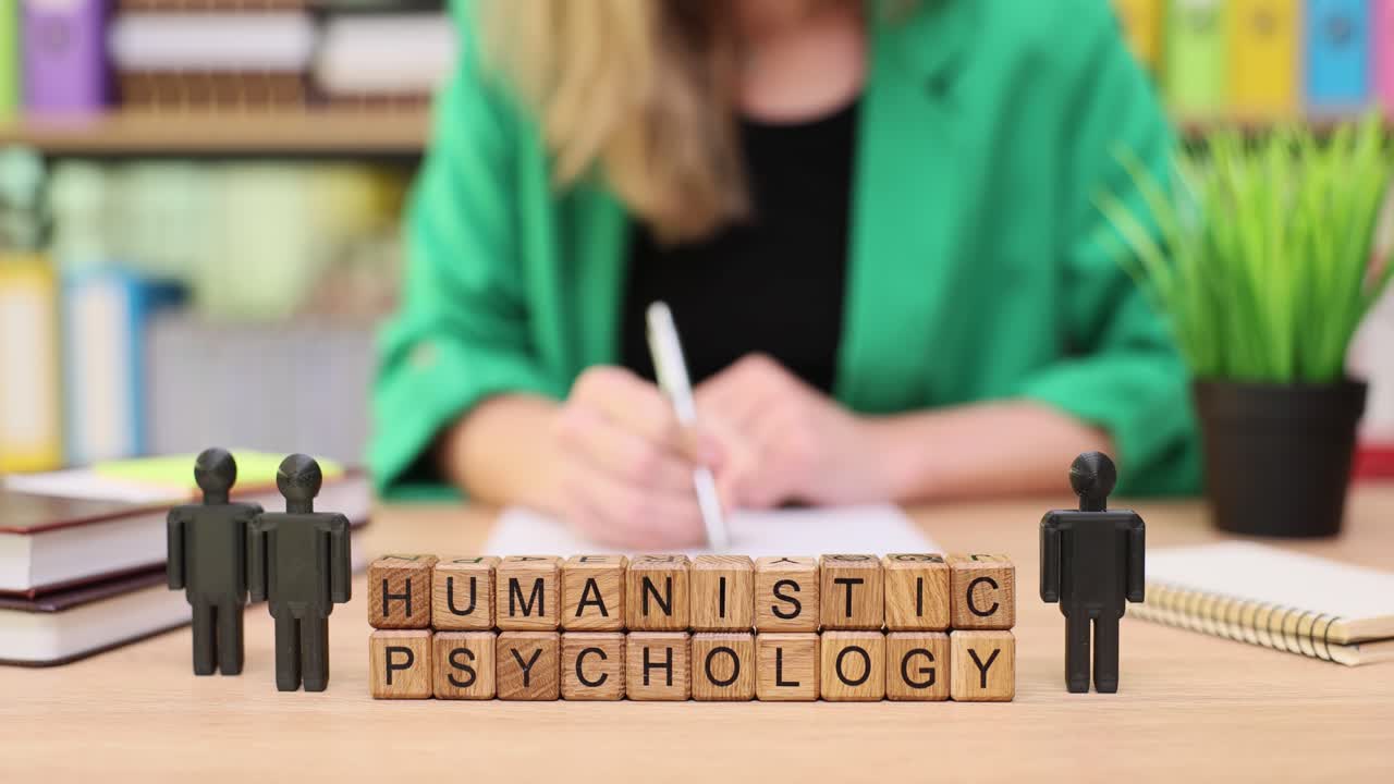 Humanistic Psychology Concept with Wooden Blocks and People