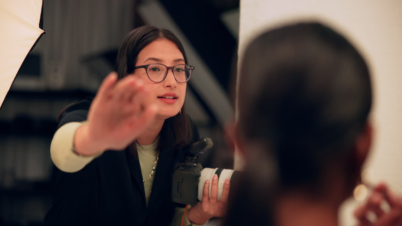 Photographer getting ready to take a portrait in the studio