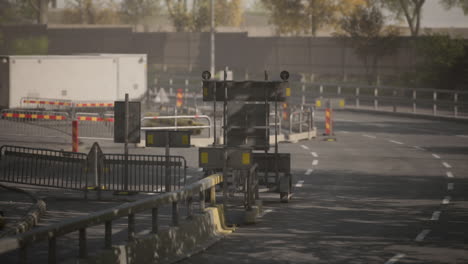 road construction area shows barriers and light equipment during daytime