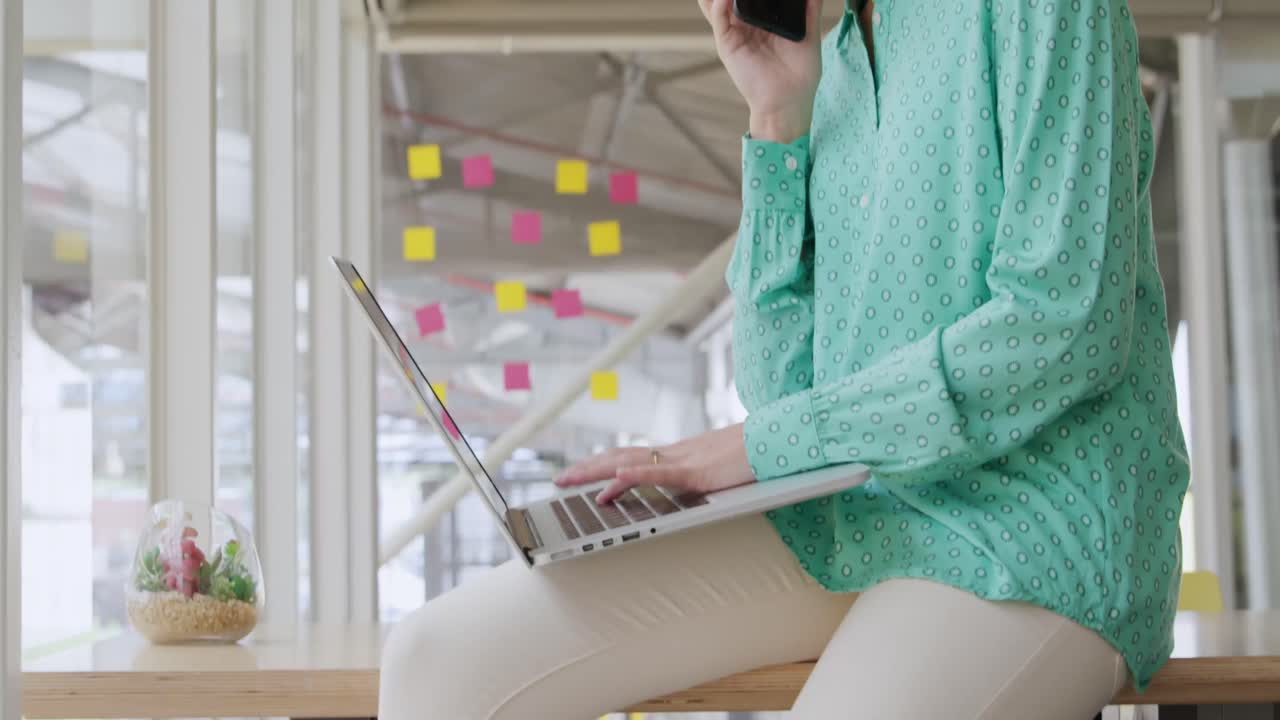 Young woman working in a creative office