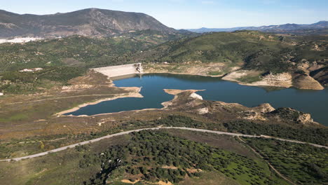 beautiful lake and dam near zahara de la sierra, aerial view