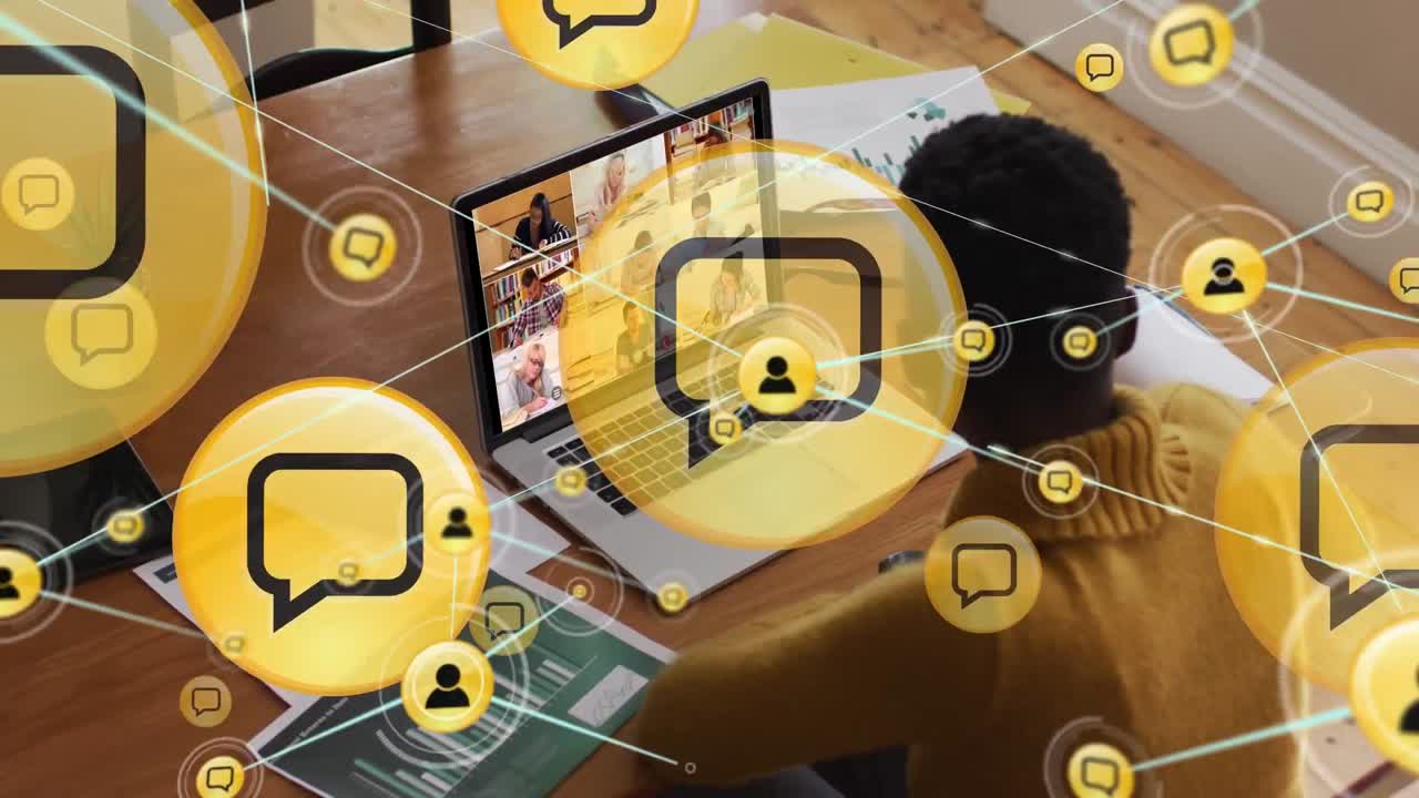 Animation of media icons over african american female teacher having laptop video call with students
