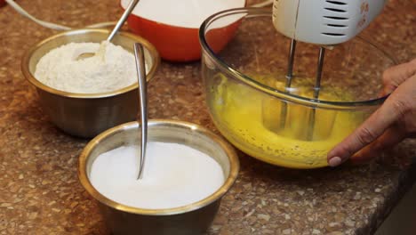 cake batter mix preparation beating eggs closeup