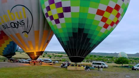hot air balloons in flight at goreme village, cappadocia, hot air balloon festival