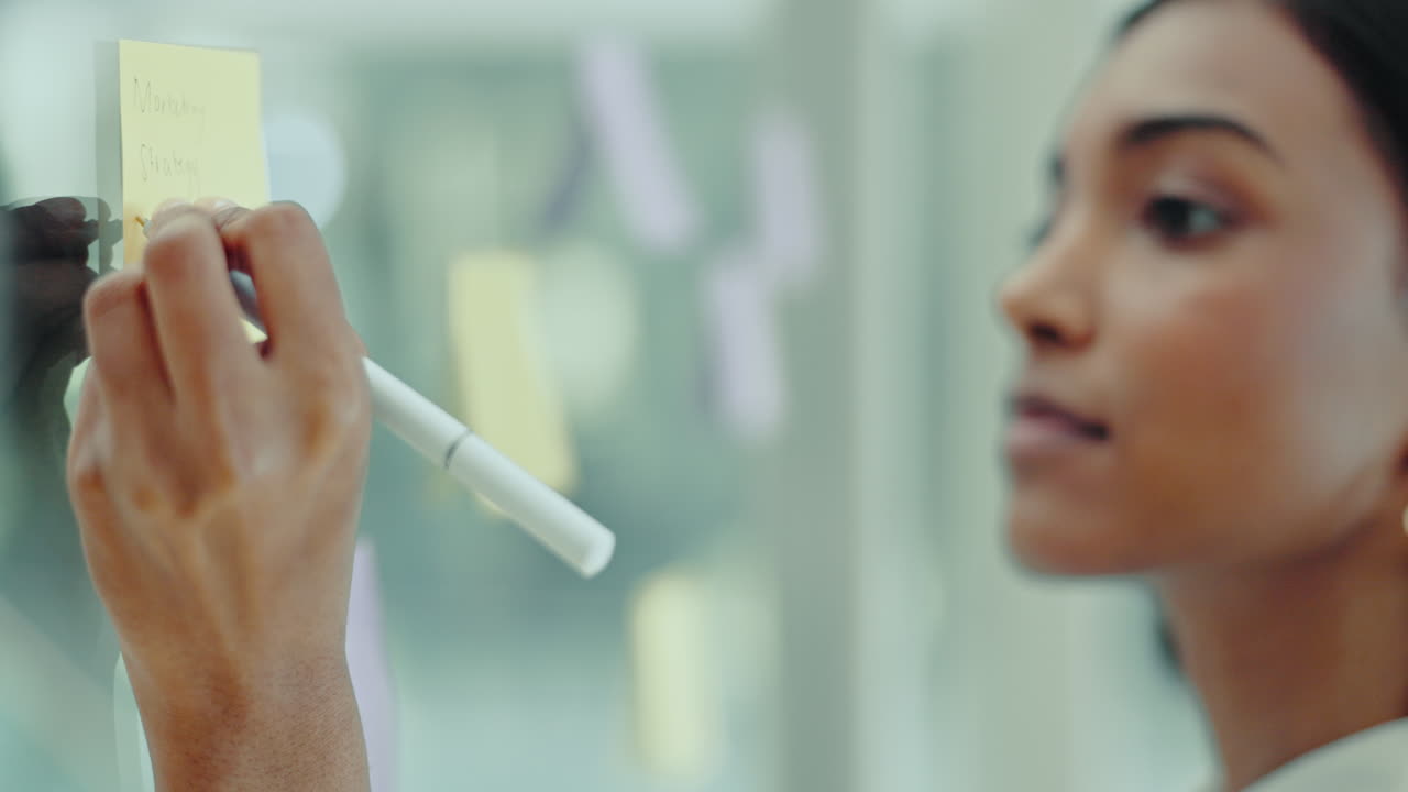 Writing, planning and business Indian woman