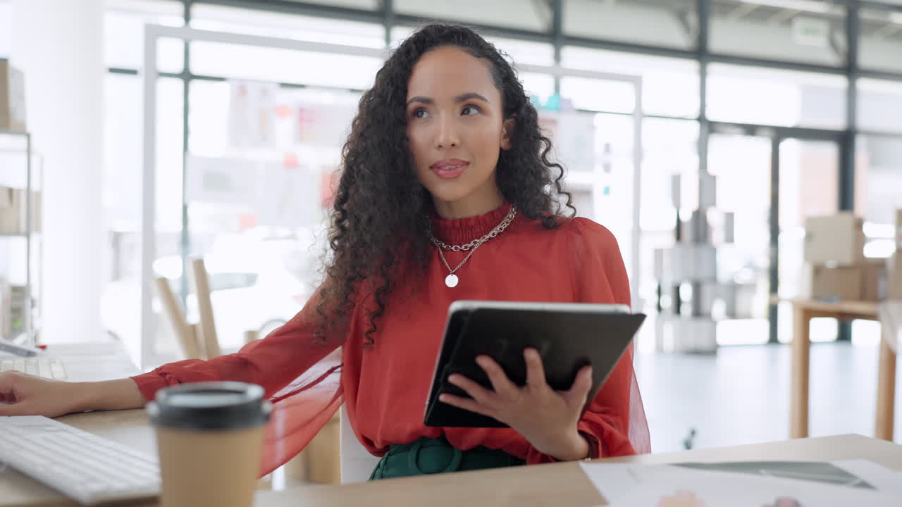Fashion designer woman on tablet