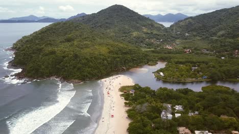 wide beach meeting a river on the brazilian