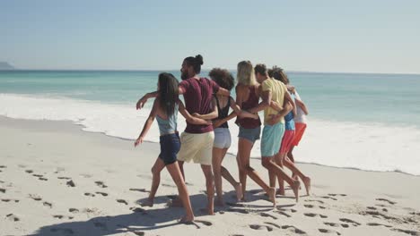 friends walking seaside