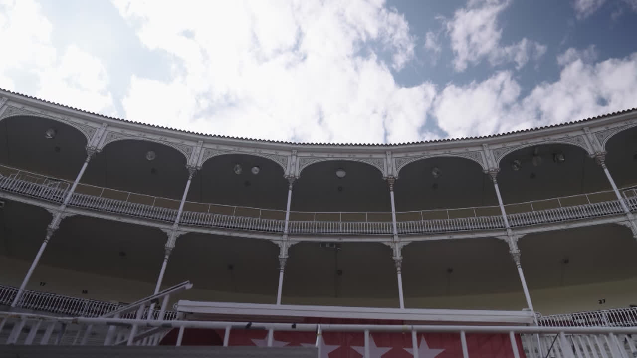 Beautiful general shot of the boxes and stands from inside the Las Ventas bullring in Madrid recorded on a cloudy morning.