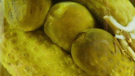 pickled cucumbers in a jar