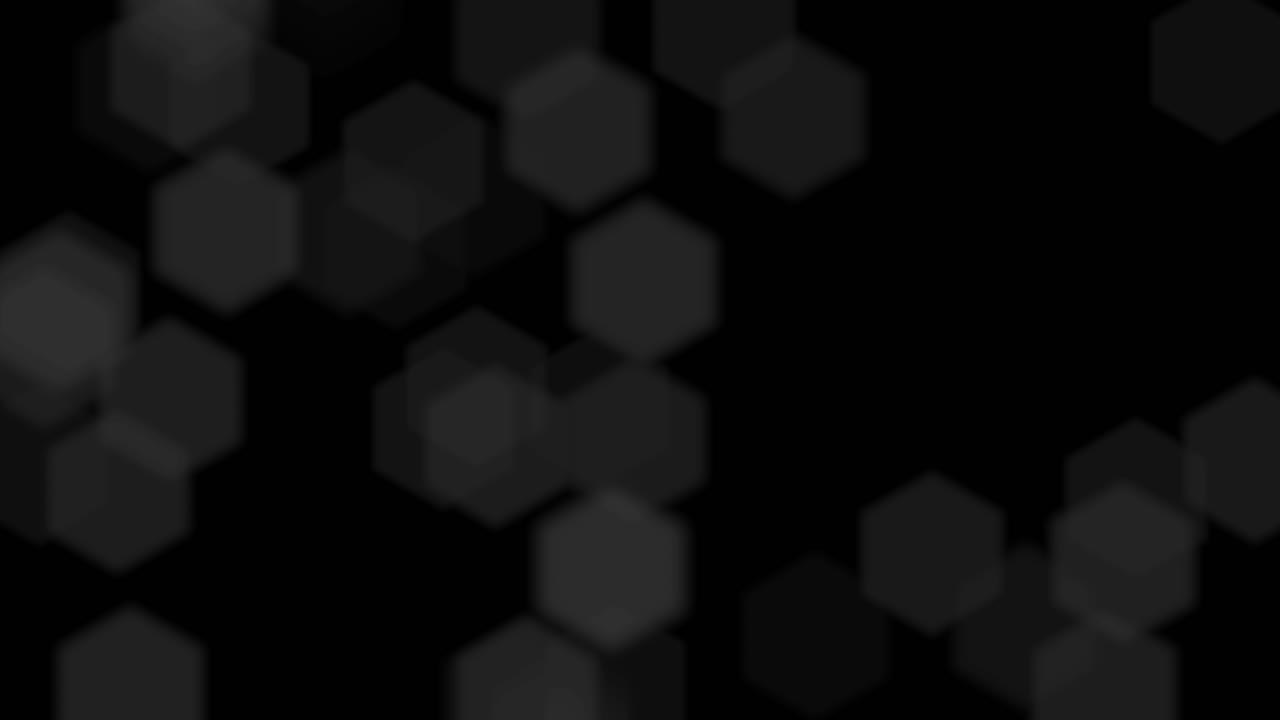 Efecto bokeh superpuesto desenfocado, formas hexagonales flotando sobre un fondo negro, animación en bucle