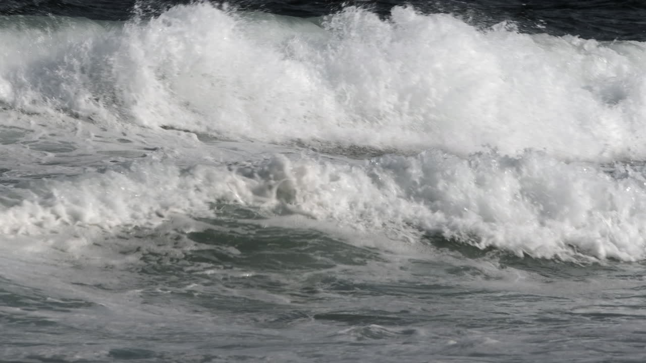 Incoming tidal waves off the south coast of Cornwall, England.
