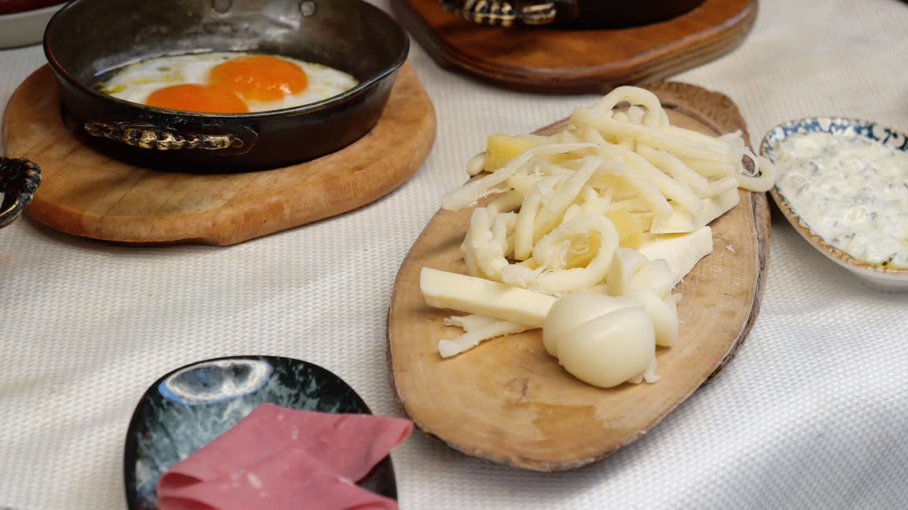 Turkish Breakfast with Eggs, Cheese, and Olives