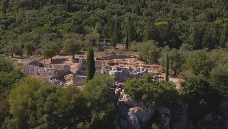 drone shooting parallax of ancient ruins of odysseus' palace in ithaka, archeological exavation site