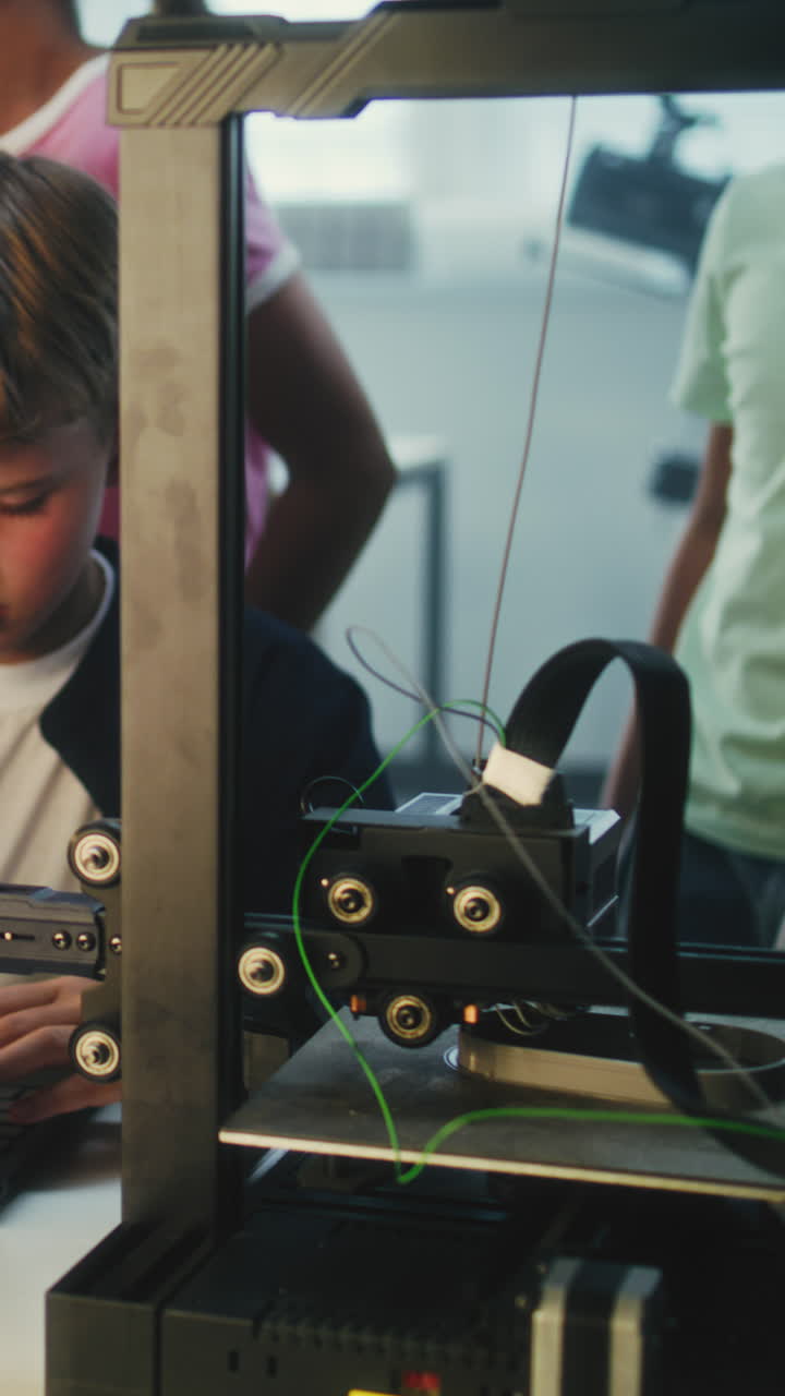 Boy learning 3D printing in a classroom