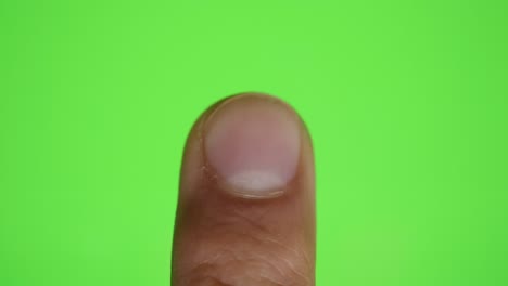 scanning fingerprint on green mock-up screen. mobile phone. scan biometric identity approval. cyber security personal device. fingerprint biometric scanning on green screen. technology finger print.