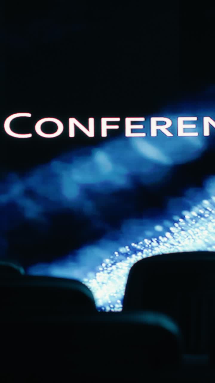 Vertical Video Empty stage and chairs in auditorium at business conference event
