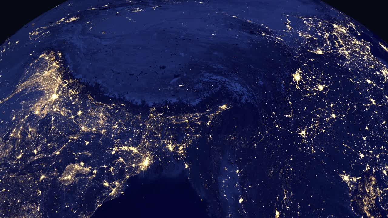 Digital animation zooms from outer space into a night view of Thimphu, Bhutan