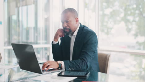 Black-businessman,-thinking