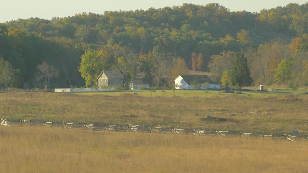 Buildings among fall trees on mountain landscape near the American Civil War battlefields in Gettysburg, PA USA