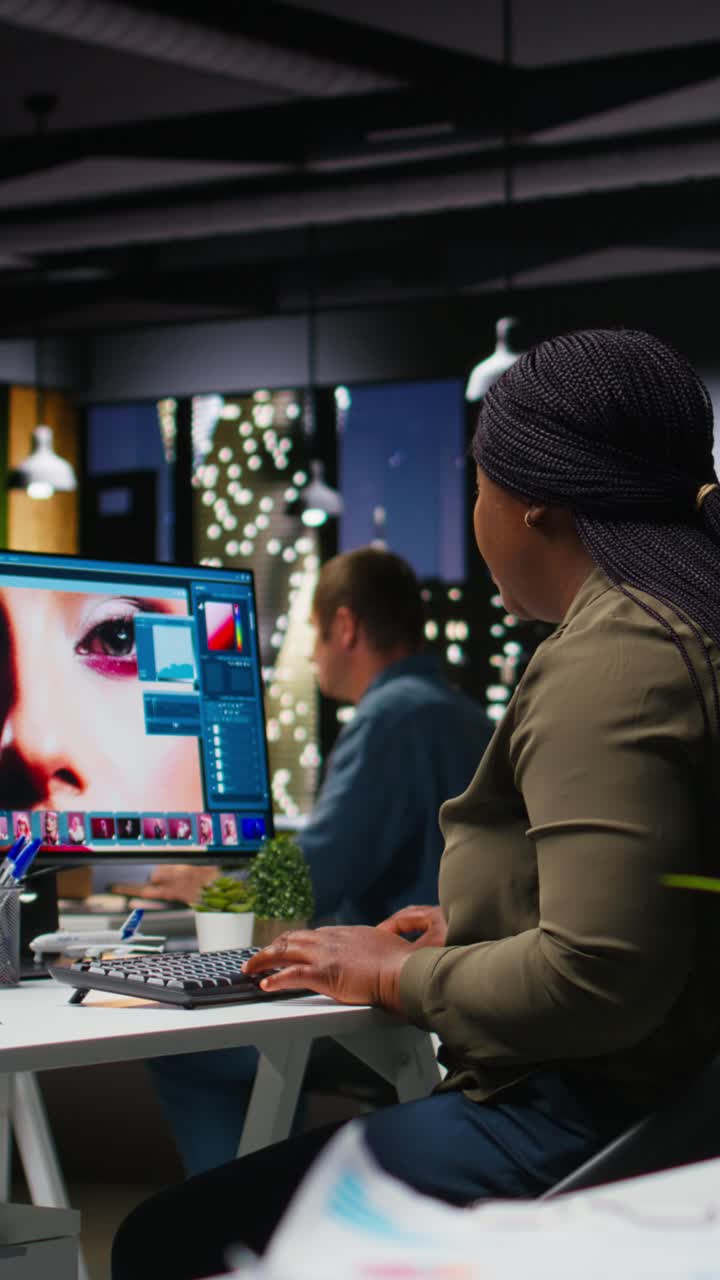 Vertical Video Black graphic designer uses AI neural networks for retouching images