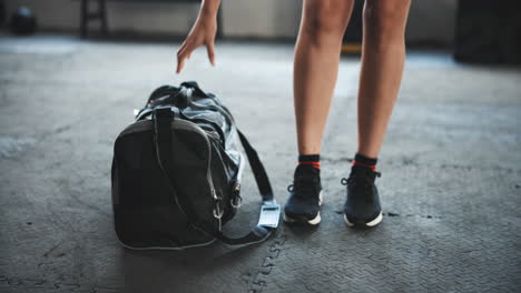 sports, woman and walking in gym with bag