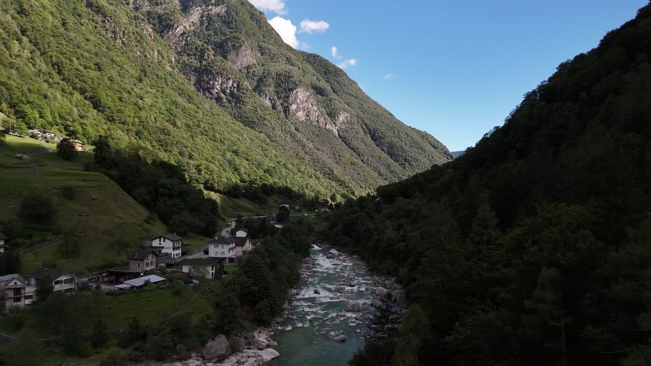 Aerial over Verzasca river Valle Maggia valley Ticino, Switzerland over rocky landscape