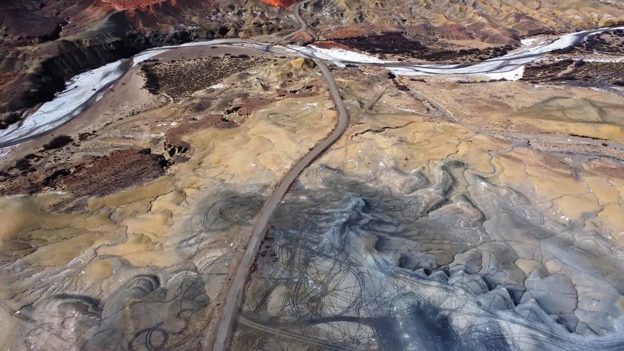Frozen river in rocky canyon on sunny day in USA