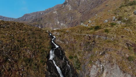 4k-aerial-drone-footage-with-the-1st-waterfall-of-Pichgacocha-from-Ambo,-Huanuco,-Peru-in-the-Andes-mountains