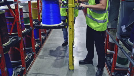 factory manufacturing electrical cable. view inside modern plant producing power electric cables