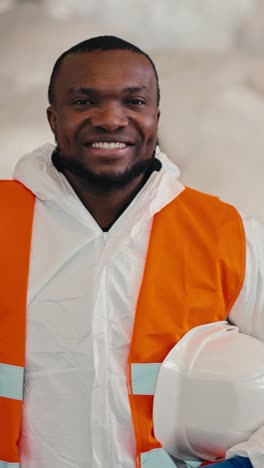 smiling worker in protective gear