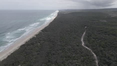 Aerial-View-Of-Stunning-Beaches-In-A-Lush-Tropical-Island