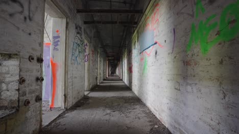 Shadowy-mysterious-sinister-character,-creepy-spooky-extended-hallway