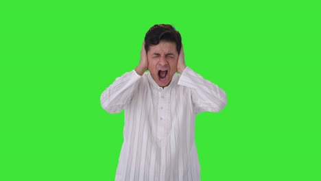 frustrated indian man shouting loud green screen