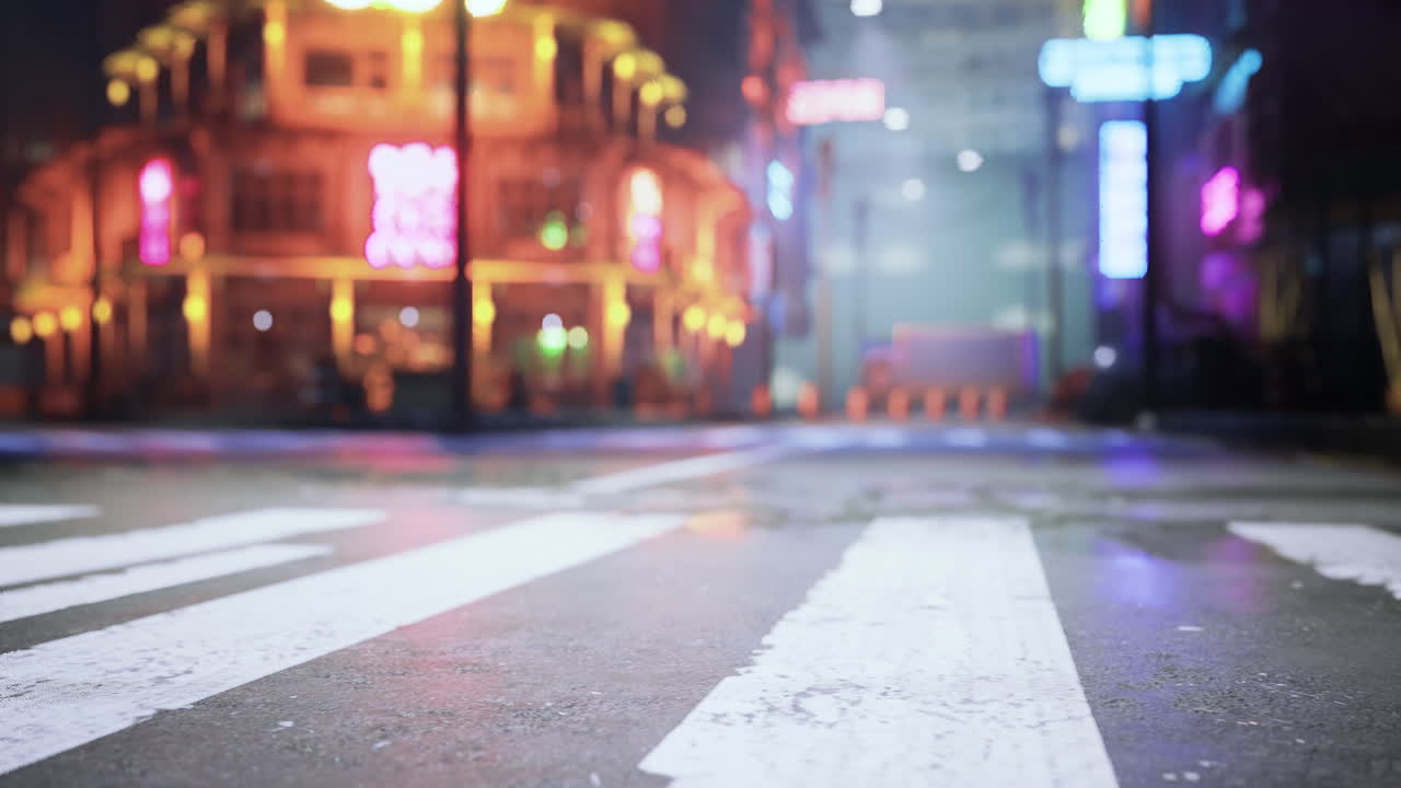 Bright neon lights illuminate empty street in urban nightlife setting