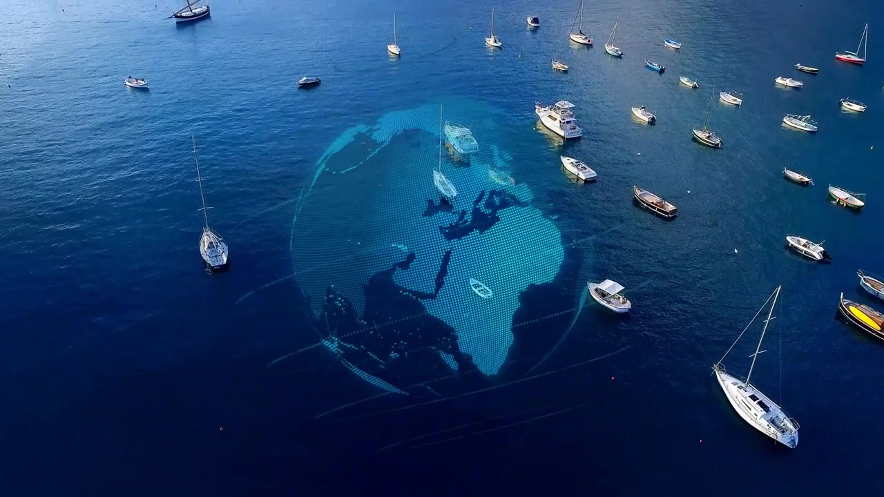 Aerial camera descending initiating dotted hologram globe rotating over bay, mapping boat positions